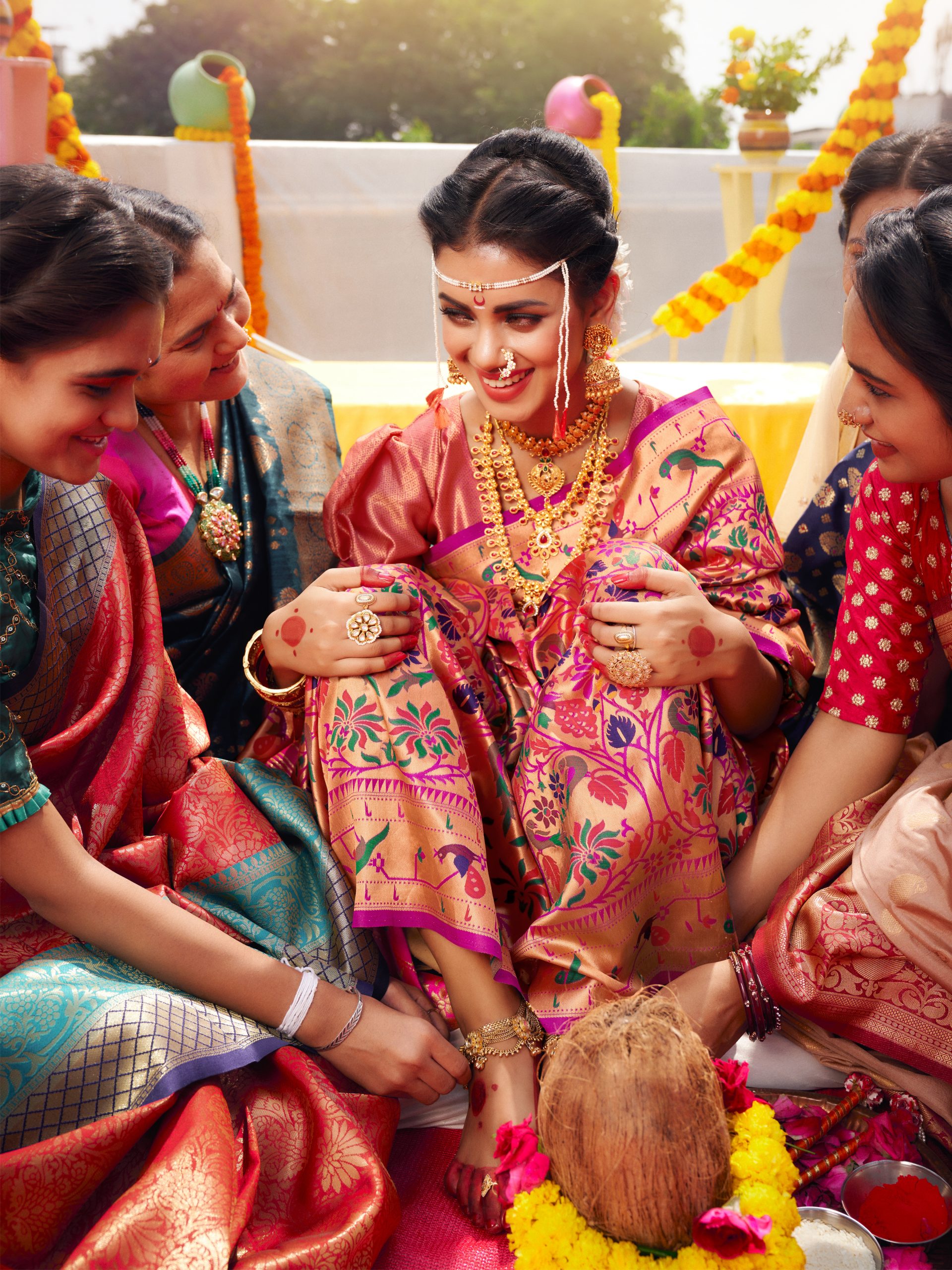 woman wearing Julahaa paithani saree in her wedding event